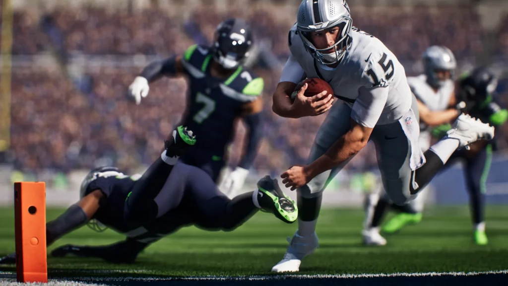 Footballspieler mit Ball sprintet in Madden NFL 27 an der Verteidigung vorbei in Richtung Endzone.