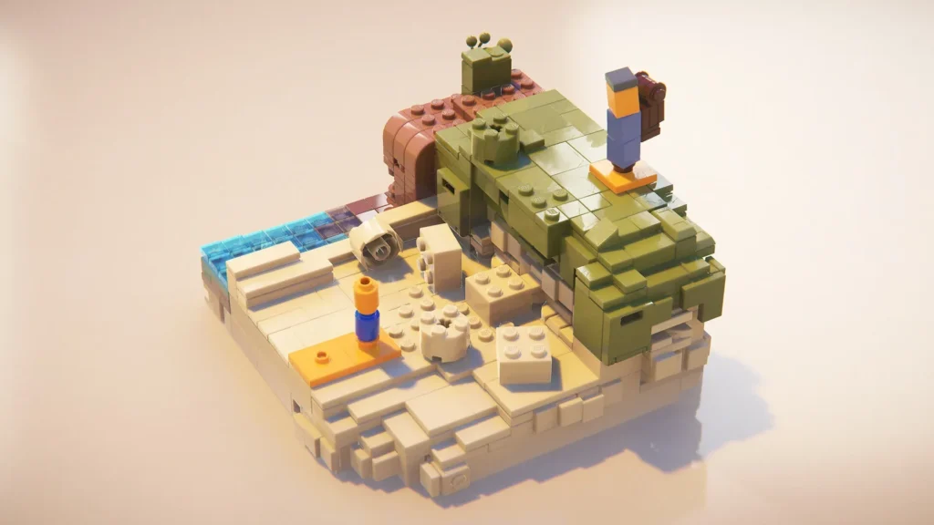 LEGO-Diorama mit zwei kleinen Figuren am Strand zwischen Sand, Wasser und grünem Bauwerk.