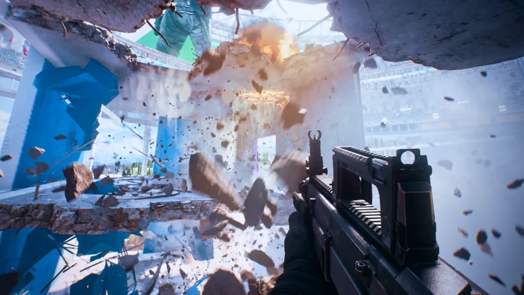 Ein Gewehr zielt auf eine einstürzende Wand in der virtuellen Arena von THE FINALS